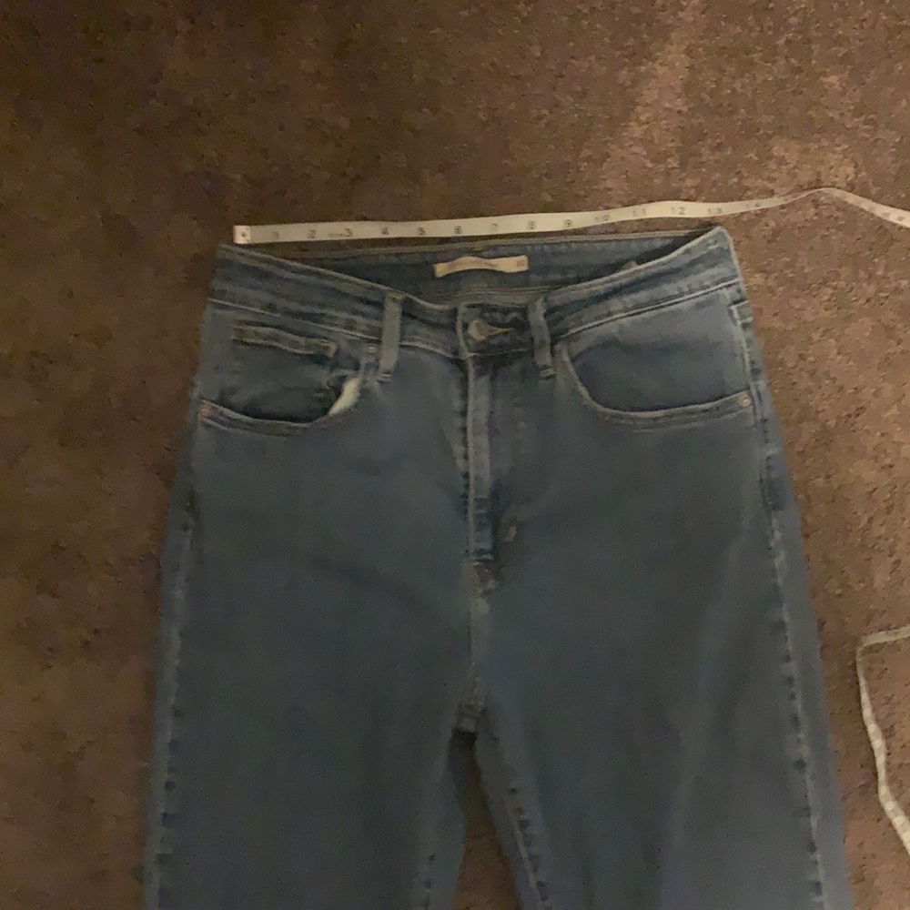 721 high rise  skinny Levi’s with frayed hem